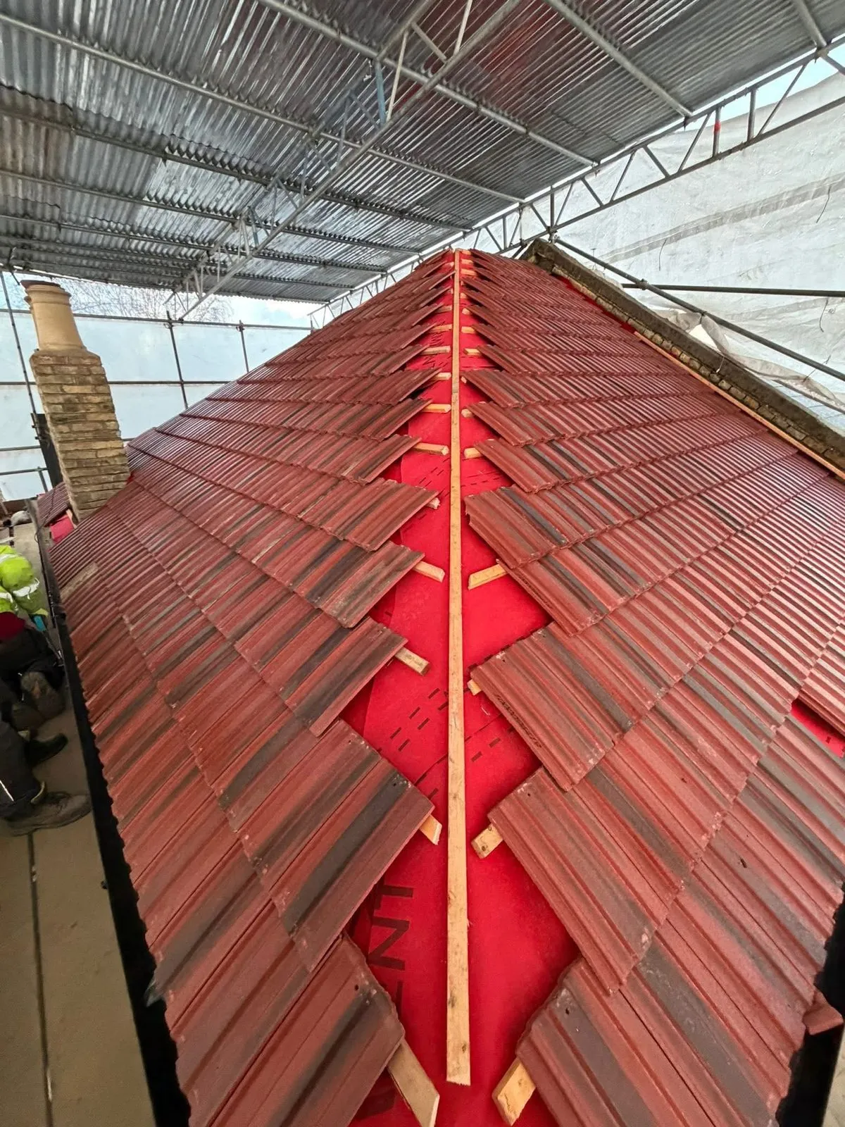 Complete roof replacement with new clay tiles in Mullion